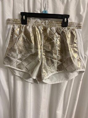 Under Armour Womens Metallic Gold Running Shorts Loose Fit HeatGear Size M